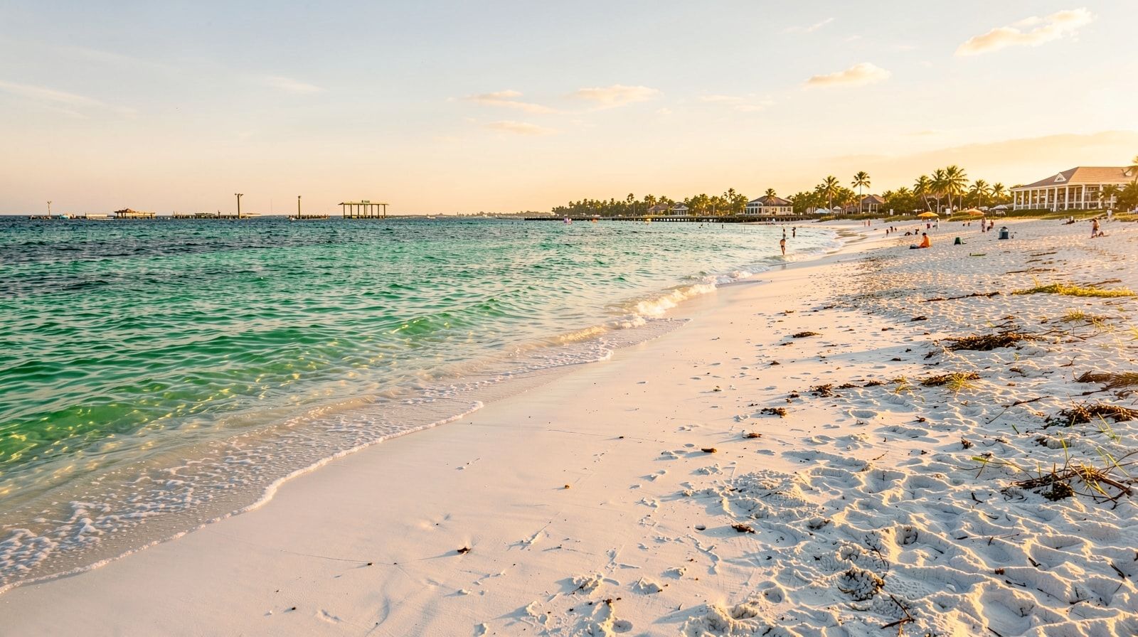 Uncrowded Destin Florida beach in September with calm emerald water and golden afternoon light