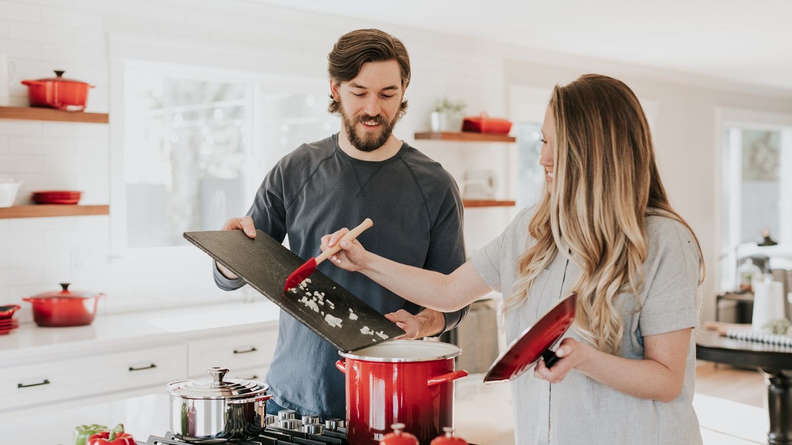 Well-stocked bright kitchen with fresh groceries, a bowl of fruit, and morning light — perfect vacation rental setup