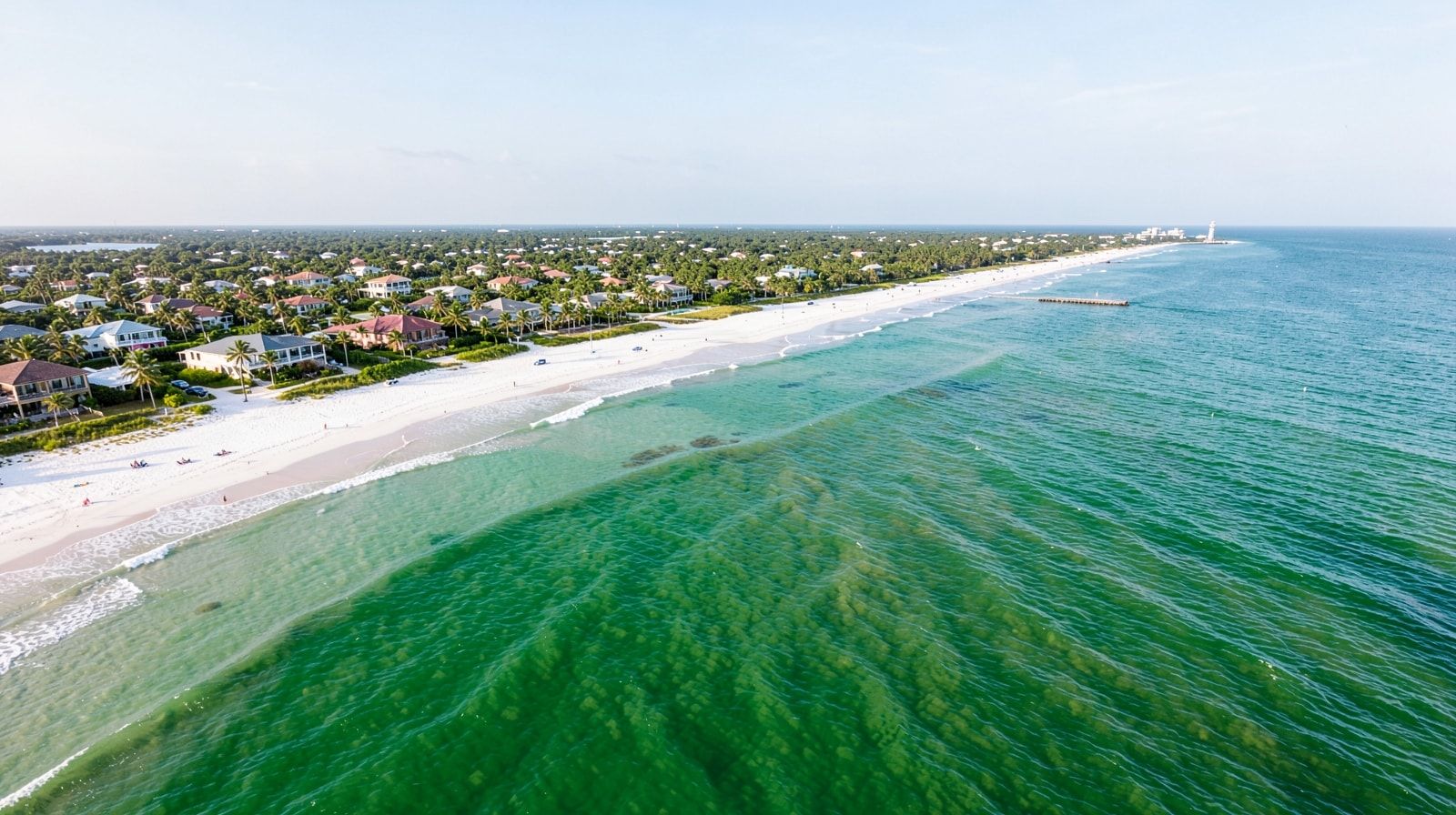 Aerial view of Destin Florida's emerald Gulf water and white sand beaches